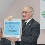 Stanislav Belikov with a diploma